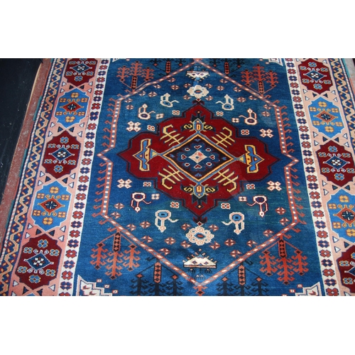 362 - Turkish rug decorated with a large geometric medallion to the centre, guls and further geometric mot... 