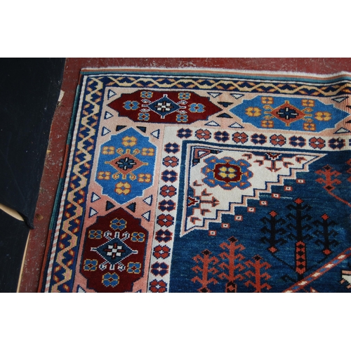 362 - Turkish rug decorated with a large geometric medallion to the centre, guls and further geometric mot... 