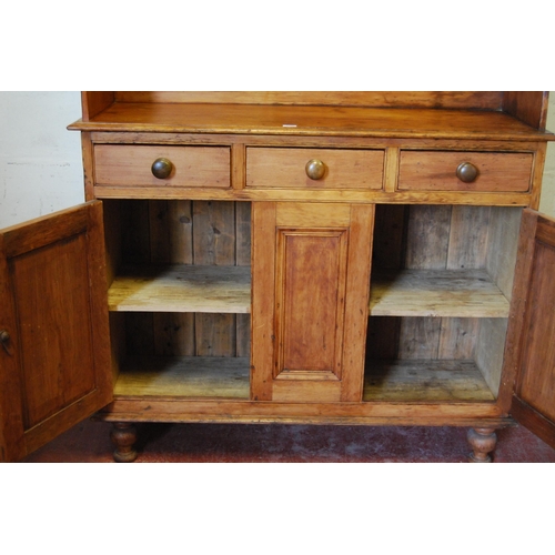 408 - Victorian Scotch pine dresser with five short drawers to the gallery back above three large drawers ... 