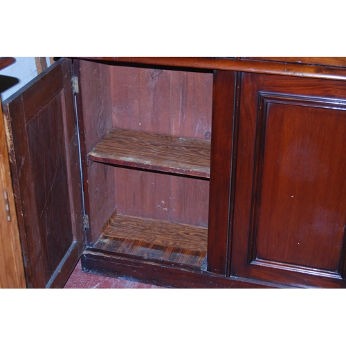 409 - Victorian mahogany library bookcase with Gothic-influenced roundels to the shaped cornice above thre... 