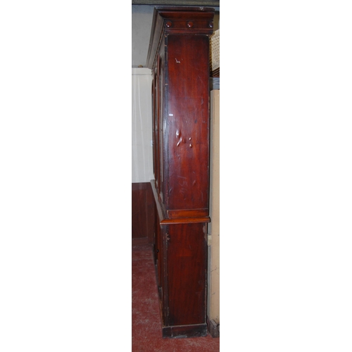 409 - Victorian mahogany library bookcase with Gothic-influenced roundels to the shaped cornice above thre... 