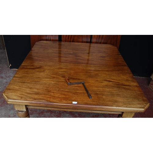 412 - Late Victorian mahogany extending dining table with three additional leaves, on baluster legs with c... 