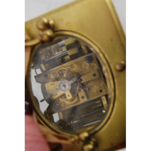 165 - Brass repeater carriage clock with subsidiary seconds dial, with key, 12cm high.