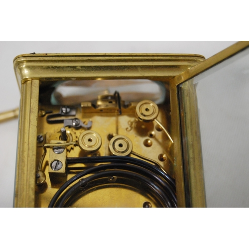 165 - Brass repeater carriage clock with subsidiary seconds dial, with key, 12cm high.