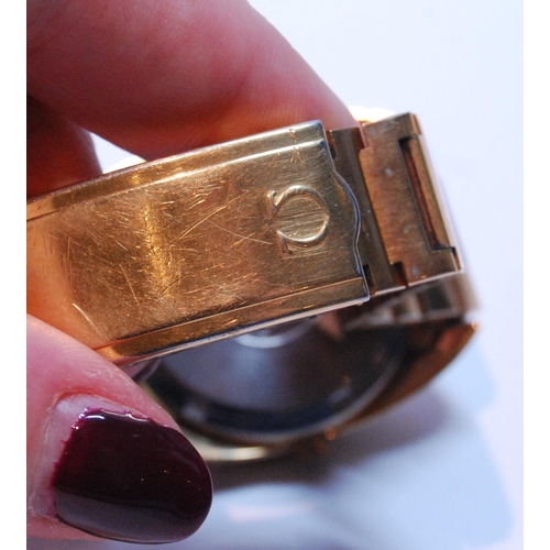 81 - Gent's Omega Megaquartz rolled gold bracelet watch, 40mm, including button.