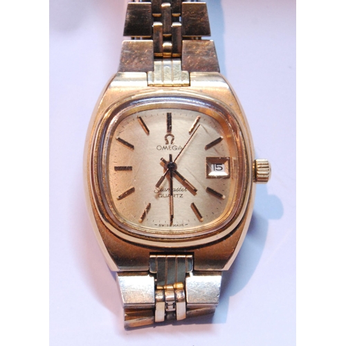 82 - Lady's Omega Seamaster quartz rolled gold bracelet watch, 29mm, including button.