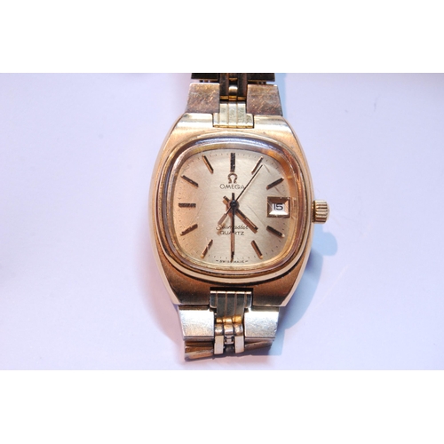 82 - Lady's Omega Seamaster quartz rolled gold bracelet watch, 29mm, including button.