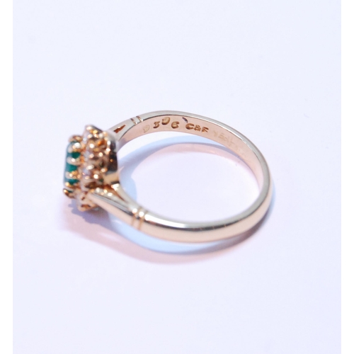 92 - Diamond and emerald oval cluster ring, the emerald approximately 5mm x 4mm, and small diamond brilli... 