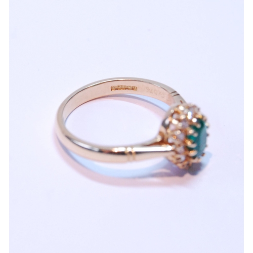 92 - Diamond and emerald oval cluster ring, the emerald approximately 5mm x 4mm, and small diamond brilli... 