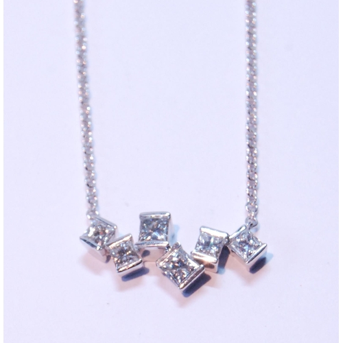 95 - Diamond pendant with six randomly-set rectangular diamond brilliants, in 18ct white gold.