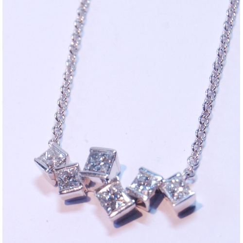 95 - Diamond pendant with six randomly-set rectangular diamond brilliants, in 18ct white gold.