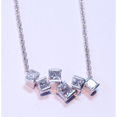 95 - Diamond pendant with six randomly-set rectangular diamond brilliants, in 18ct white gold.