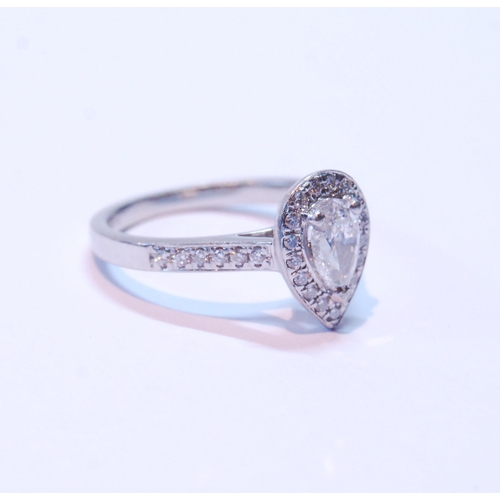 97 - Diamond pear-shaped cluster ring with brilliant, the border and shoulders set with tiny brilliants, ... 