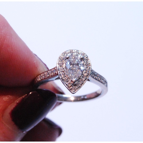 97 - Diamond pear-shaped cluster ring with brilliant, the border and shoulders set with tiny brilliants, ... 