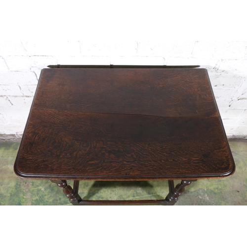 473 - An 18th century oak side table, the top with moulded edge over frieze drawer with later handles, rai... 