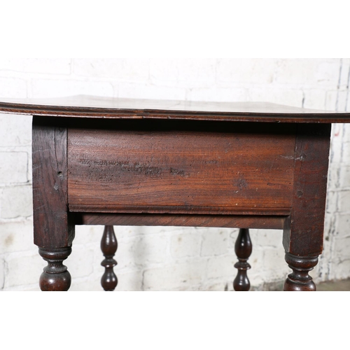 473 - An 18th century oak side table, the top with moulded edge over frieze drawer with later handles, rai... 