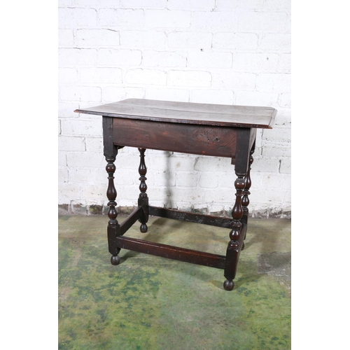 473 - An 18th century oak side table, the top with moulded edge over frieze drawer with later handles, rai... 