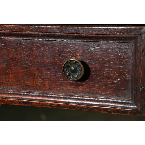 473 - An 18th century oak side table, the top with moulded edge over frieze drawer with later handles, rai... 