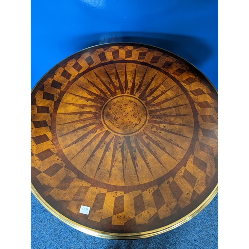 474 - A modern centre table with circular parquetry top with bass edge on barley twist support on circular... 