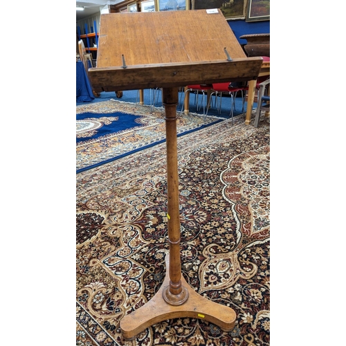 480 - 19th century mahogany music stand, with tilt-top, raised on turned support and tripod base, 120cm wh... 