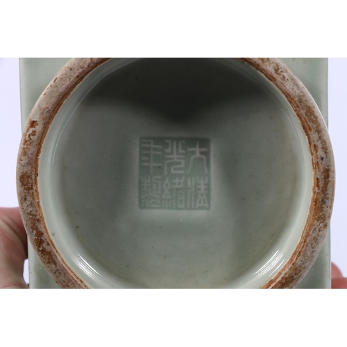 394 - Chinese celadon porcelain vase of square section, decorated with relief floral designs, reign seal m... 