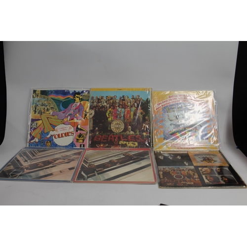 366 - Collection of Beatles records and singles to include Sgt Peppers American issue, A Collection of Bea... 