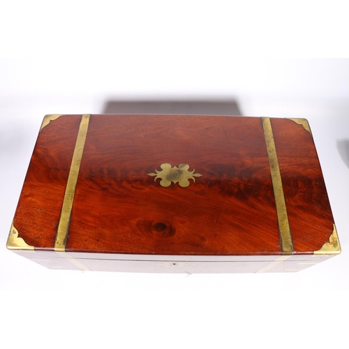 266 - Victorian mahogany campaign style writing slope, the hinged top enclosing a tooled interior, with br... 