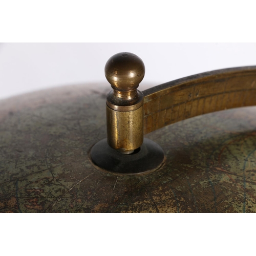 271 - W and A K Johnston of Edinburgh New Century 12 inch terrestrial globe raised on cast iron tripod bas... 