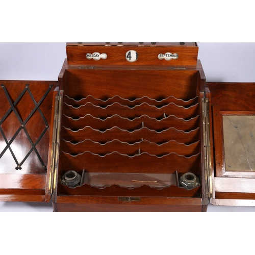 279 - Victorian mahogany slope-fronted stationary box, the top with day-date-month calendar, two doors ope... 