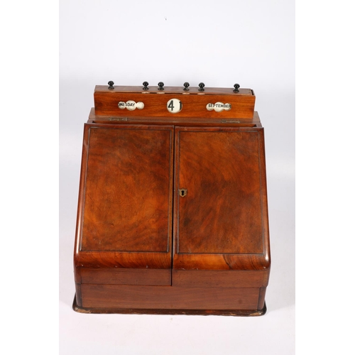 279 - Victorian mahogany slope-fronted stationary box, the top with day-date-month calendar, two doors ope... 