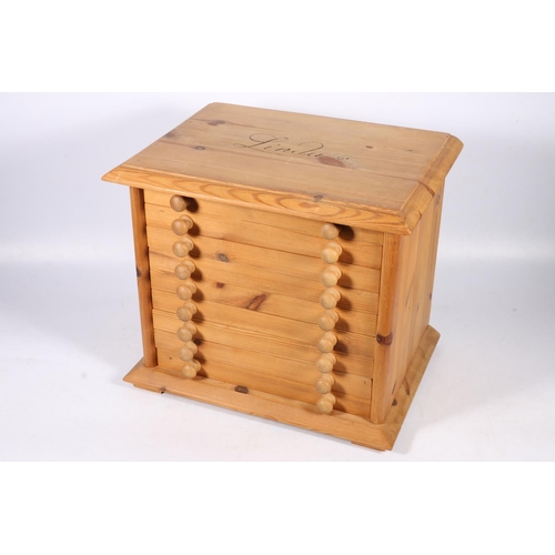 282 - 20th century pine nine-drawer specimen chest raised on plinth base with block feet, 38cm wide.