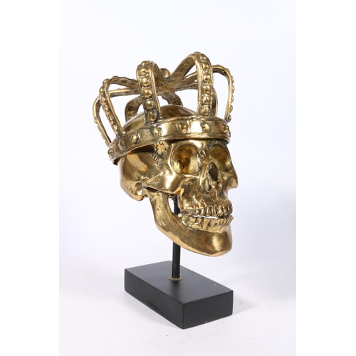 285 - 20th century bronze sculpture in the form of a skull wearing crown, titled 'Louis XIV', raised on pl... 