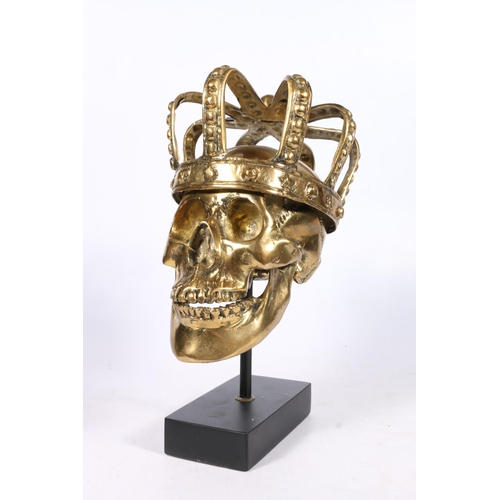 285 - 20th century bronze sculpture in the form of a skull wearing crown, titled 'Louis XIV', raised on pl... 