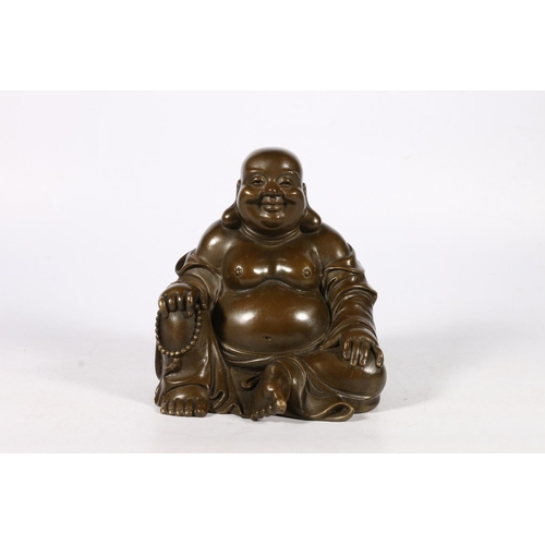 286 - 20th century bronze statue of Buddha, 17cm tall.