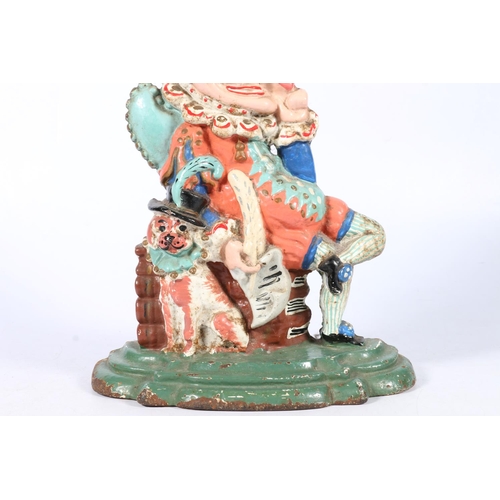 293 - Painted cast iron doorstop in the form of Punch, 30cm tall.