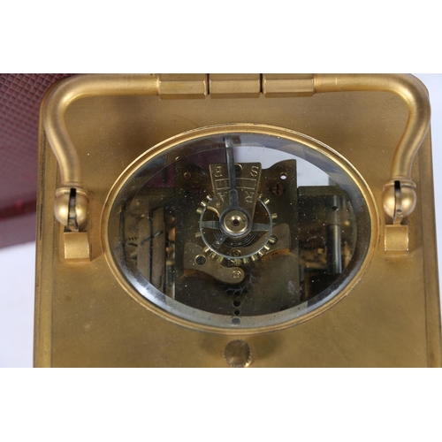 294 - French brass repeater carriage clock with anchor escapement, the dial with subsidiary alarm, strikin... 