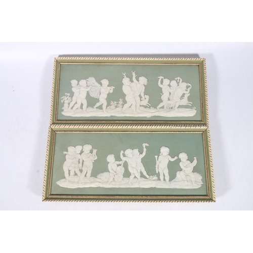 308 - Pair of Wedgwood green jasper ware panels depicting cherubs hunting and cherub musicians, each panel... 