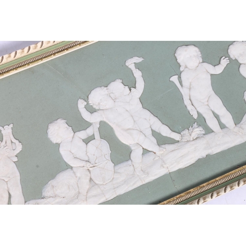 308 - Pair of Wedgwood green jasper ware panels depicting cherubs hunting and cherub musicians, each panel... 