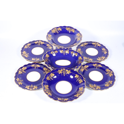 310 - George Jones Crescent China nine-piece dessert set, the cobalt blue ground decorated with gilt fruit... 