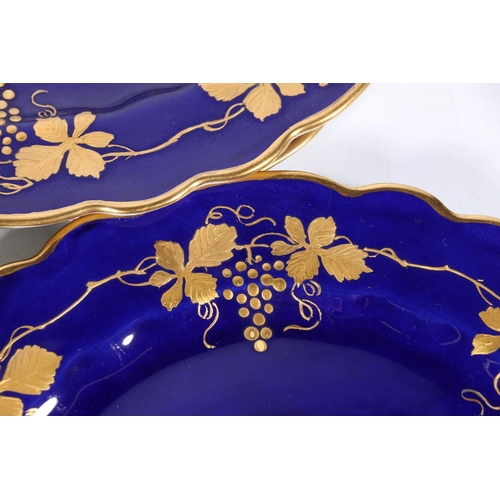 310 - George Jones Crescent China nine-piece dessert set, the cobalt blue ground decorated with gilt fruit... 