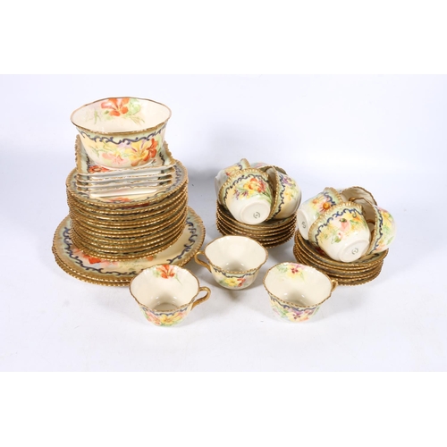 311 - Nautilus porcelain forty-two piece hand painted tea set.