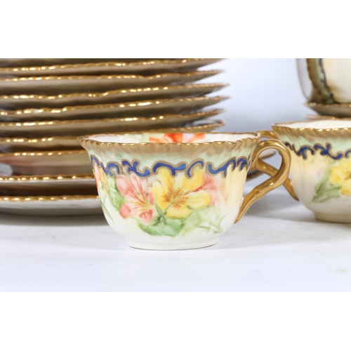 311 - Nautilus porcelain forty-two piece hand painted tea set.