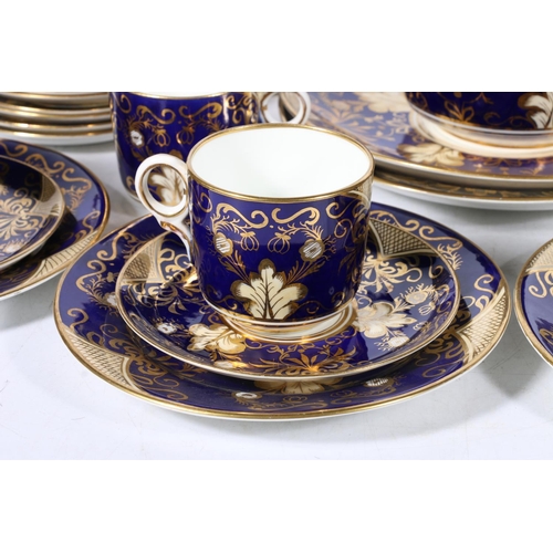 312 - 19th century English porcelain thirty-six piece tea set, the cobalt blue ground decorated with gilt ... 