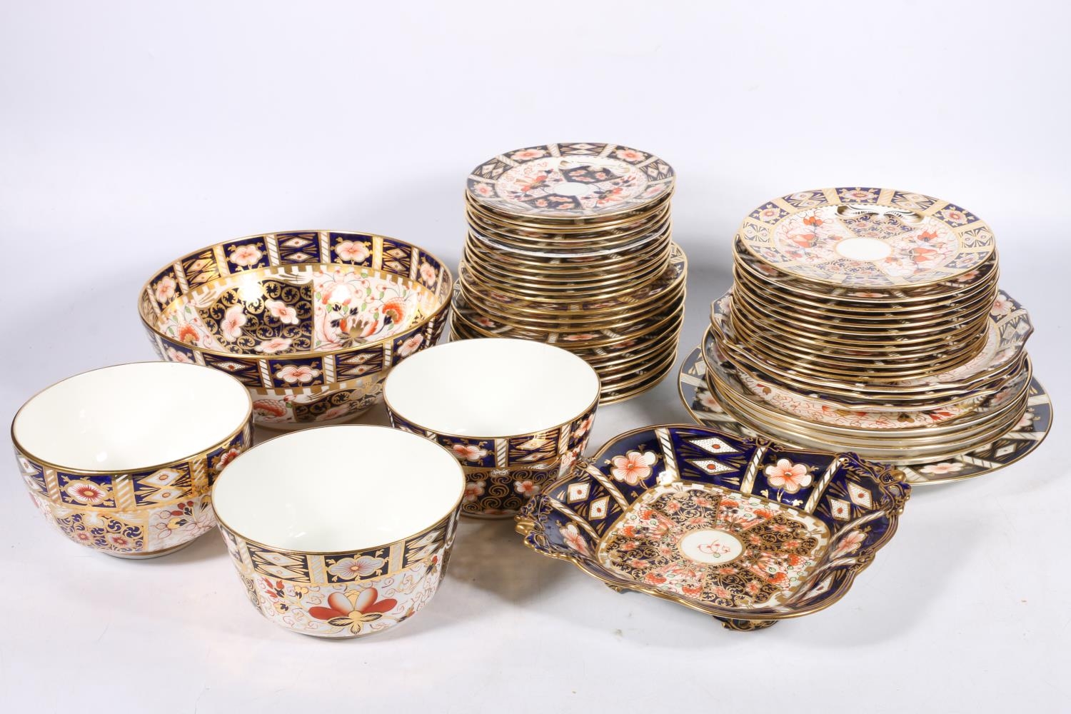 Fifty piece Royal Crown Derby bone china 2451 pattern Imari