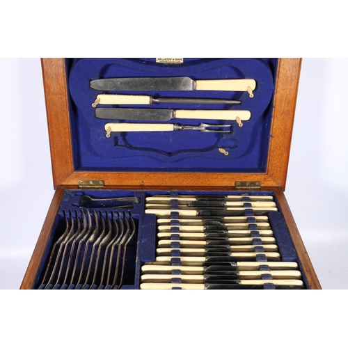 75 - William Lister and Sons of Newcastle-on-Tyne silver plated part set of flatware held in an oak three... 