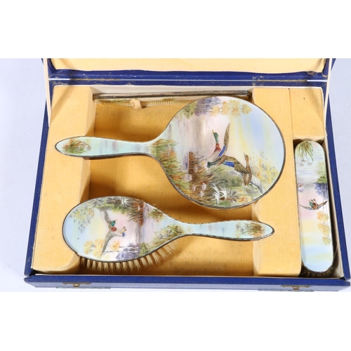 77 - George VI silver and enamel dressing table set, the enamelled reverse with design of mallard duck in... 