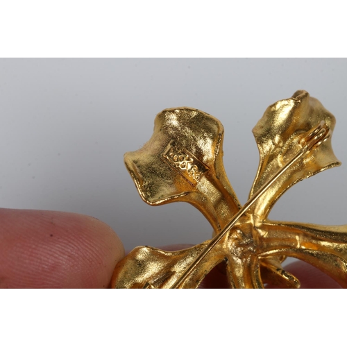 Setsco Pte Ltd of Singapore, a gilt metal brooch in the form of Vanda  Merrillii Risis orchid, 11.2g