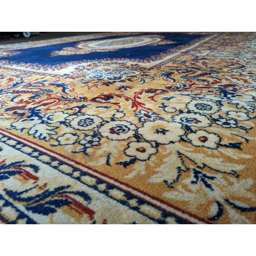 486 - Prado Oriental Keshan carpet with floral decorated central medallion on blue field within foliate bo... 