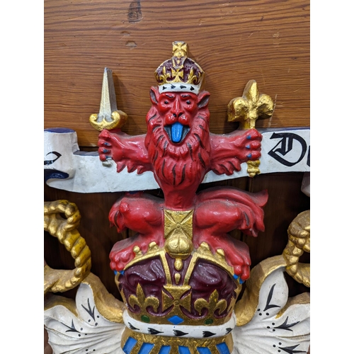 292 - Cast and painted metal plaque in the form of the Royal Scottish coat of arms, bears the mottos 'In D... 