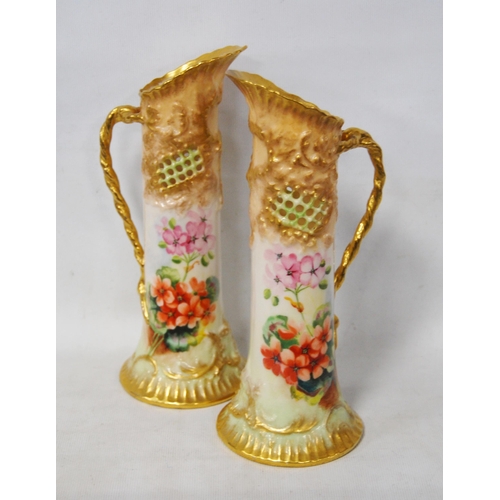 239 - Pair of Nautilus Porcelain jugs (Possil Pottery, Glasgow) decorated with floral panels and pierced l... 